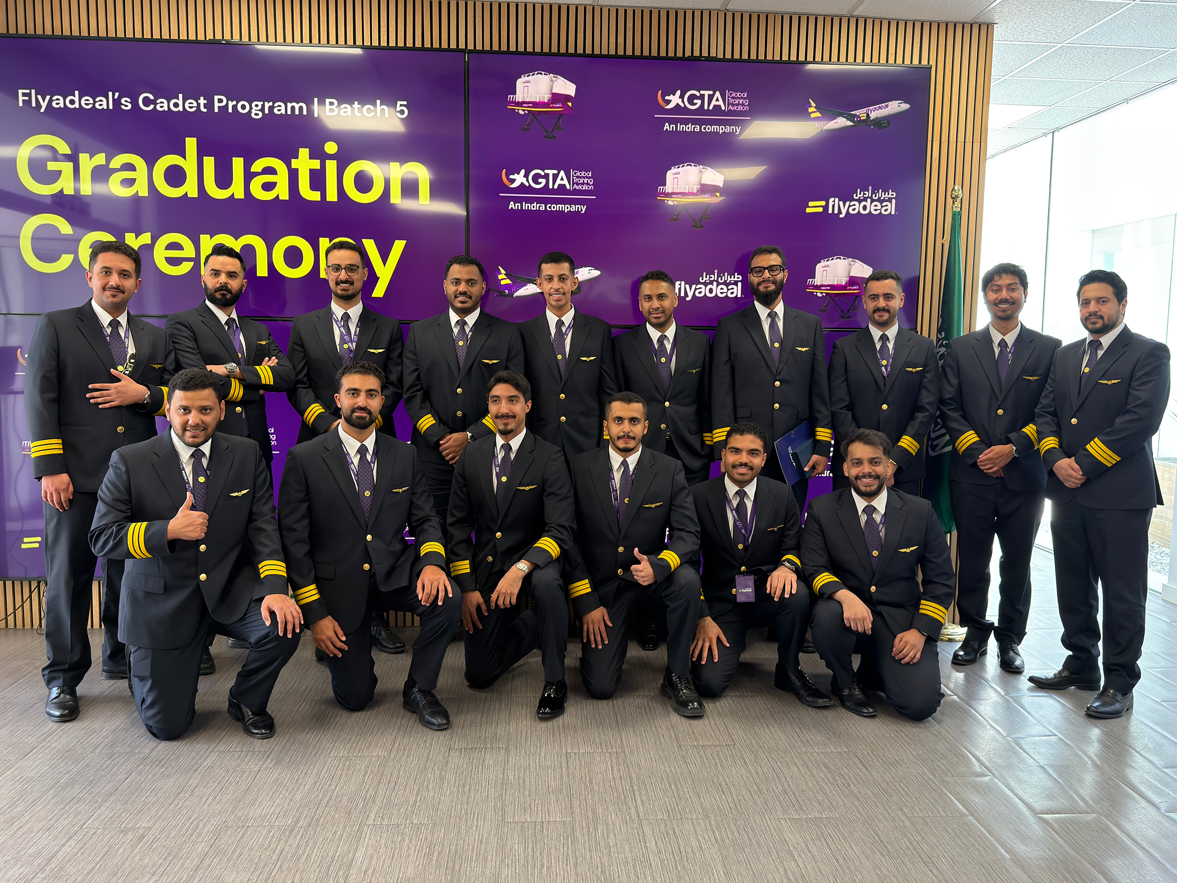 flyadeal Batch 5 cadets posing for a group photo during their graduation ceremony at the GTA training centre in Madrid.